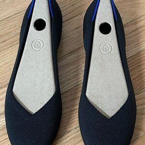 NIB. Size 7.5 Rothy's Women’s “The Flat” flats. Color is “Black Solid”.